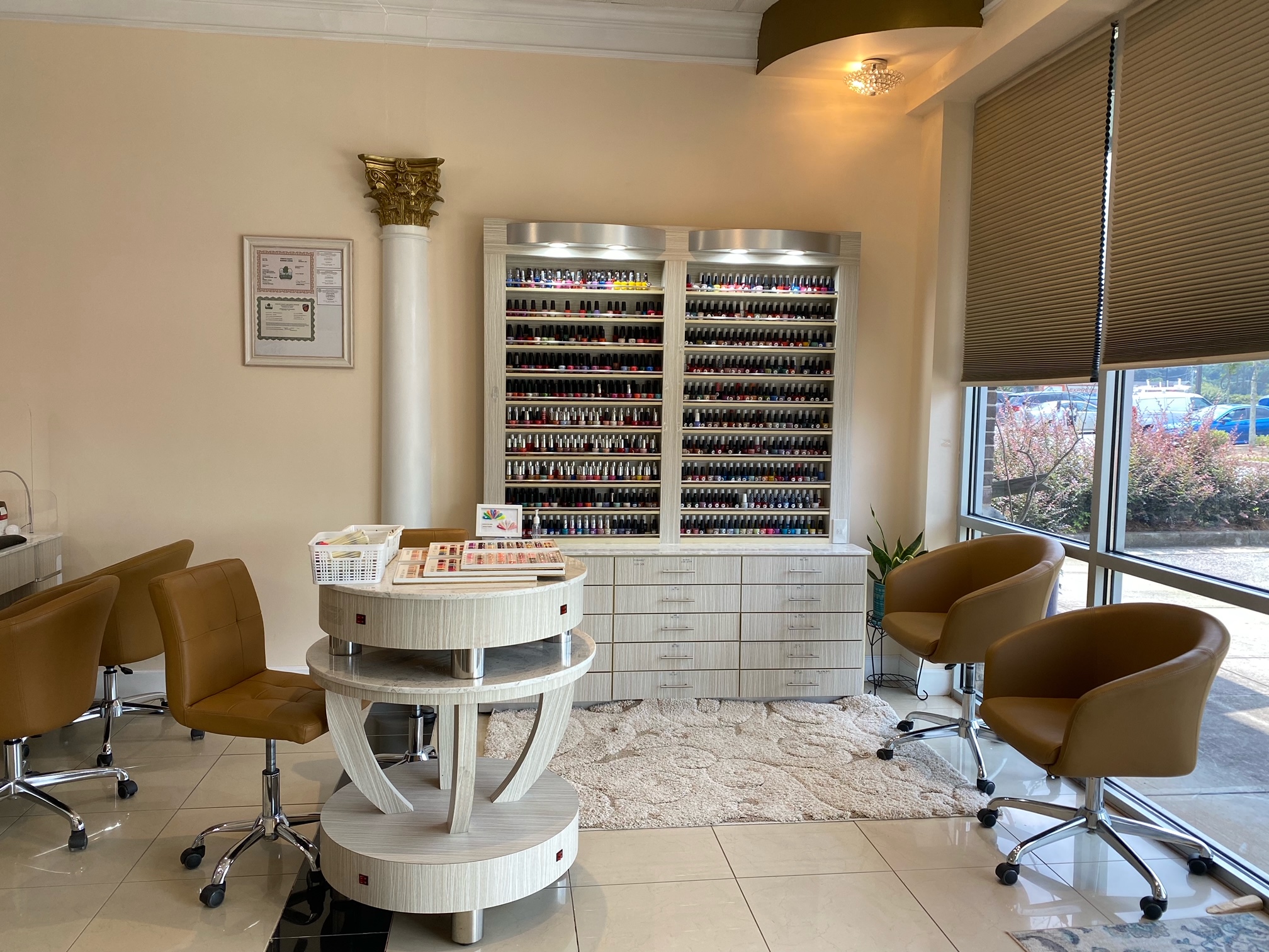 Extensive nail polish color wall display at Luminous Nails & Spa